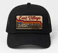 Black East Village NYC trucker cap with retro graffiti patch